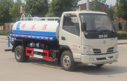 3噸灑水車價格多少_東風多利卡2.5噸藍牌綠化灑水車廠家價格3